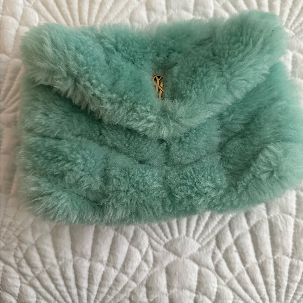 YSL Lou Lou Puffer Clutch…excellent condition. Comes with box and card holder.